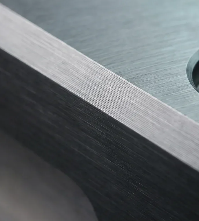 Close-up of a milled steel edge with chamfer